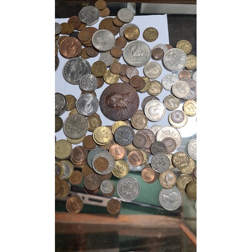 372 - Tub of various British coins & a medallion, gross weight including tub 1.41kg