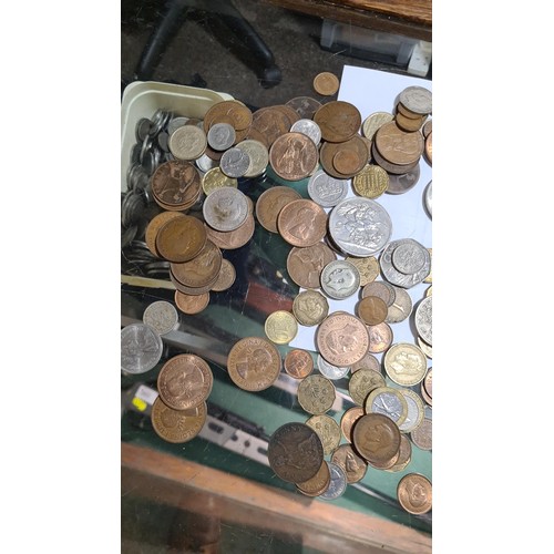 372 - Tub of various British coins & a medallion, gross weight including tub 1.41kg