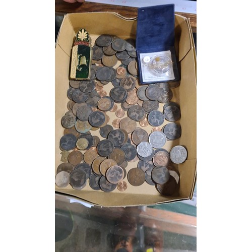 374 - Solomon Islands silver ten dollar coin, collectable 50p's, one pennies etc. together with an indentu... 