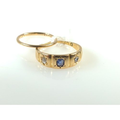 407 - Scrap 3.3 gram yellow metal, diamond & sapphire ring, hallmarks rubbed but tests positive for 18... 