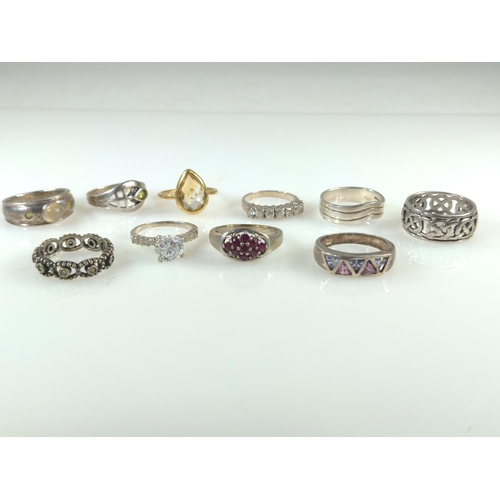 418 - Ten silver rings, including stone stone set, gross weight 38.65 grams