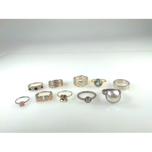 420 - Ten silver rings, including some stone set, gross weight 33 grams