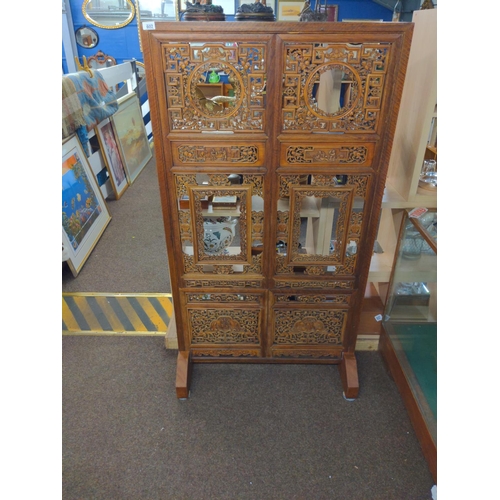 602 - Ornately carved Chinese hardwood screen with panels depicting  figures  154 cms,width 85 cms