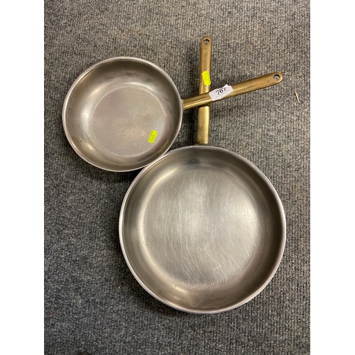 767 - Two copper shallow frying pans/skillets.