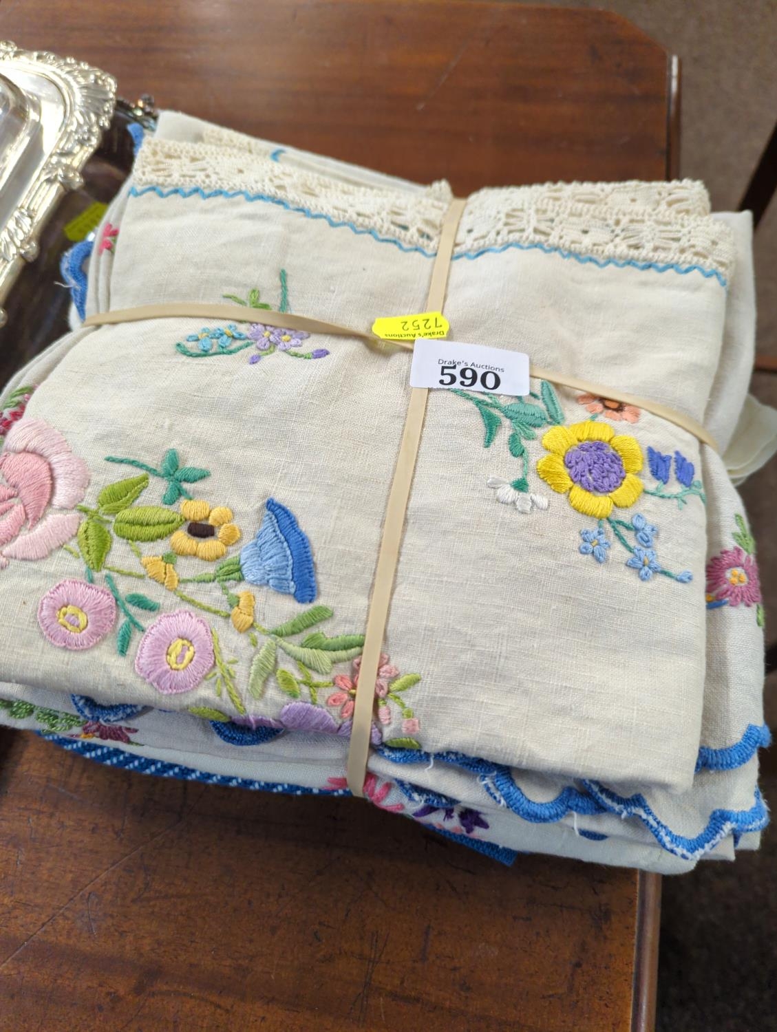 Bundle of embroidered vintage table linen