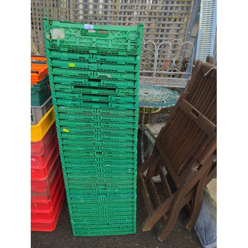 1 - Large stack of green collapsing/stacking trays