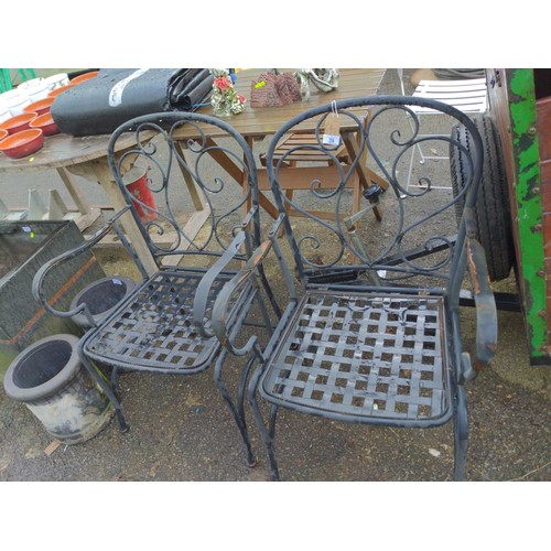 28 - Pair of metal garden seats