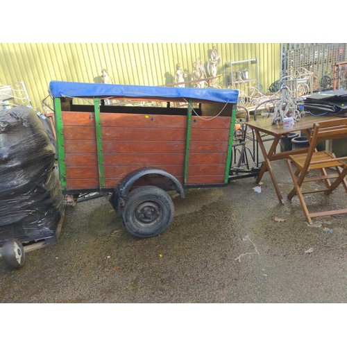 50 - Single axle trailer with tarp top and drop ramp rear. Overall L2.2m