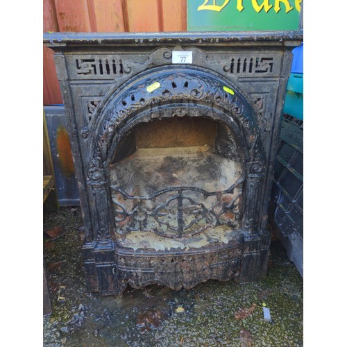 77 - Small cast fireplace