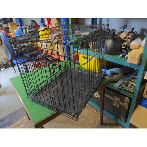 181 - 2 small pet crates,1 base 46 x 73 cms, the other 57 x 44 cms