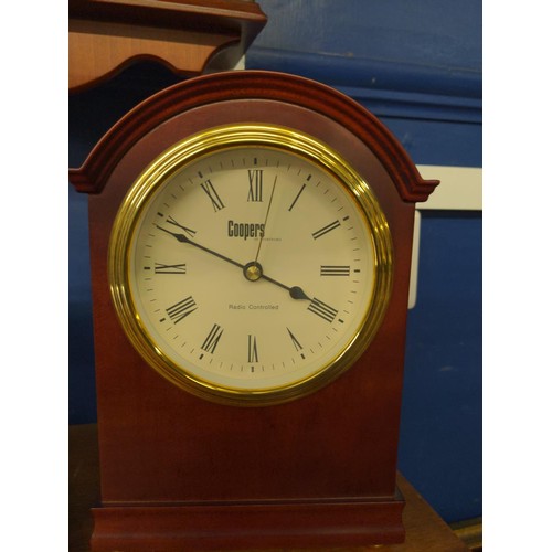 414 - Two mantle clocks, both battery operated inc. Junghans and Coopers of Stortford