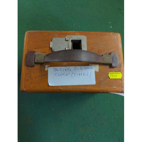 Coulet Excelsior racing pigeon timing clock with leather strap handle, height 20cm