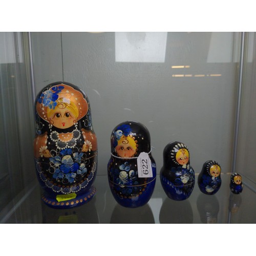 622 - Set of five Russian dolls in decorative dark blue with native dress.