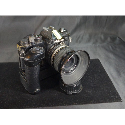 641 - Nikon FE manual SLR camera with Motor drive MD-11 and Nikkor 35 mm lens f 2.8 plus Metz 45 CT-4 flas... 