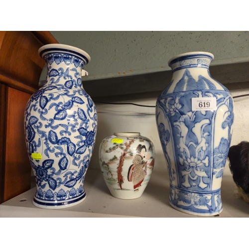 619 - Three oriental style vases. Tallest 30 cm