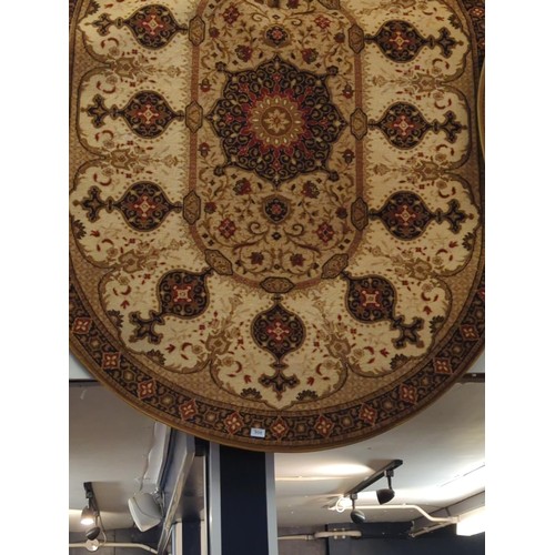 904 - Belgian oval rug. Length is 200m x 130cm