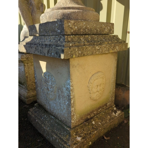 1 - An impressive pair of fluted urns, sat on square face adorned plinths. Plinths are of 3 parts, urns ... 