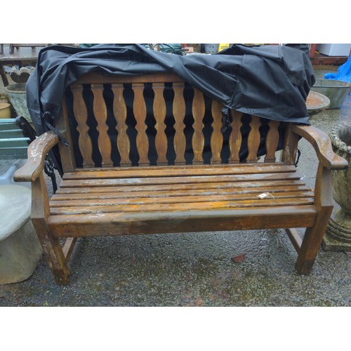 100 - Teak garden bench with weather cover. W146cm H103cm