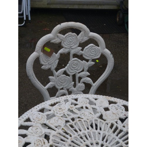 120 - Cast iron garden table and 2 chairs with rose decoration, painted white  (Table D60cm H68cm)