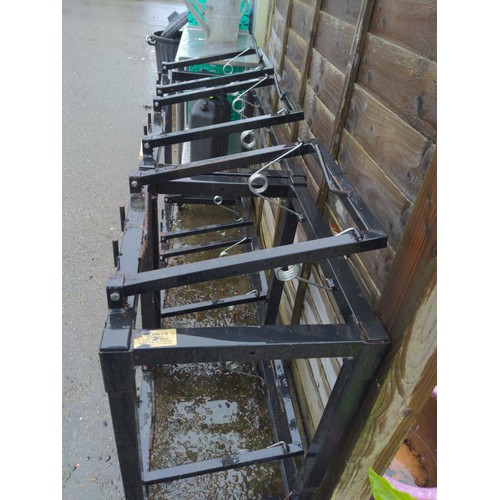 217 - Two keg/barrel stands with tilting spring loaded rests. W 108 D 46 H 100  plus W57 D 46 H 100cm