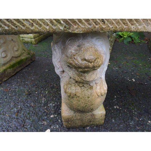 21 - Large crescent topped 3 part bench with lion & ball supports. L148cm D40cm H45cm