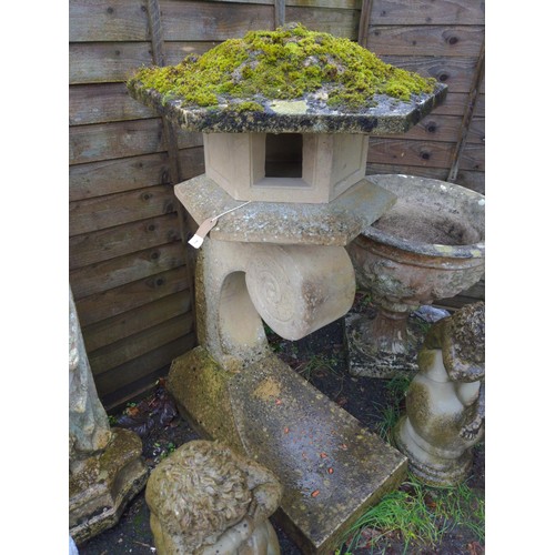 7 - Unusual pagoda topped garden feature with scroll support and solid base. H126cm D84cm