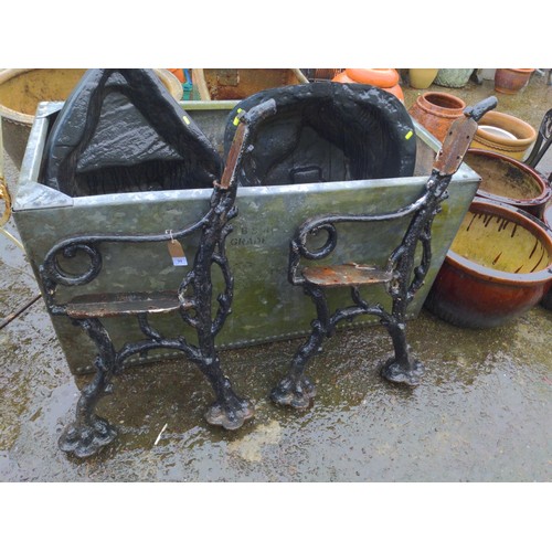 94 - Pair of early C20 cast iron bench frames, with a rustic log effect