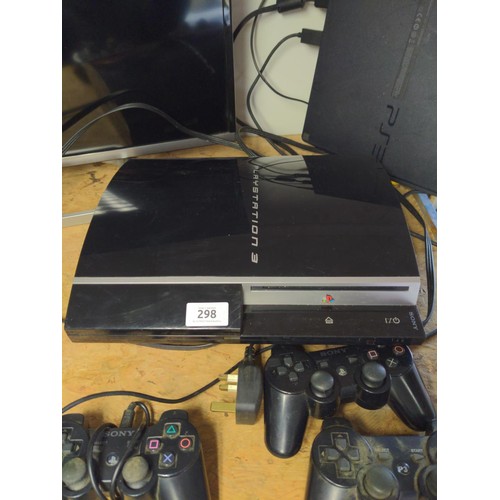 298 - Two Playstation 3 with leads and three controllers