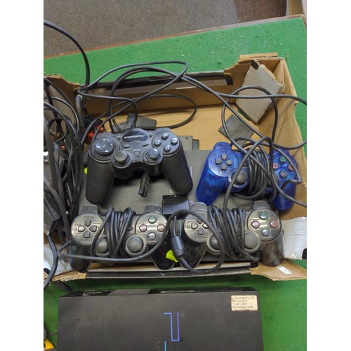 300 - Two Sony Playstation 2 with various cables and controllers