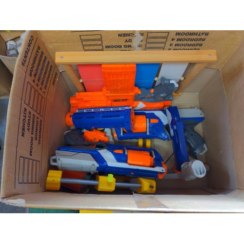 327 - Box of assorted Nerf weapons together with a target and some ammo