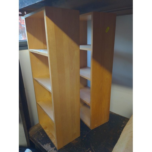 332 - Two small shelving units/CD racks, height 57cm