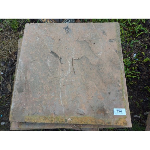 254 - 17 pink garden slabs 45x45cm and 40x40cm 