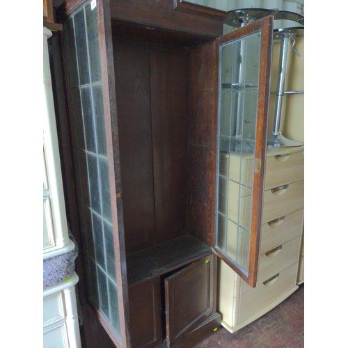 421 - Mahogany glass fronted bookcase over 2 door cupboard, fixings present but no shelvesoverall ht 211 x... 