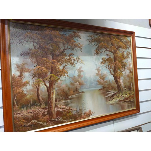 636 - Oil on canvas, signed (illegible) of an autumnal river scene 100 x 69cm