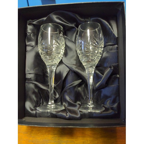 481 - Three boxes of plated flatware inc. MOP handles together with 4 Royal Doulton crystal wine glasses, ... 