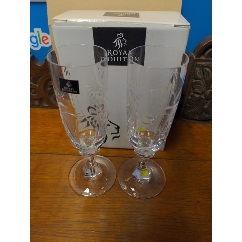 481 - Three boxes of plated flatware inc. MOP handles together with 4 Royal Doulton crystal wine glasses, ... 