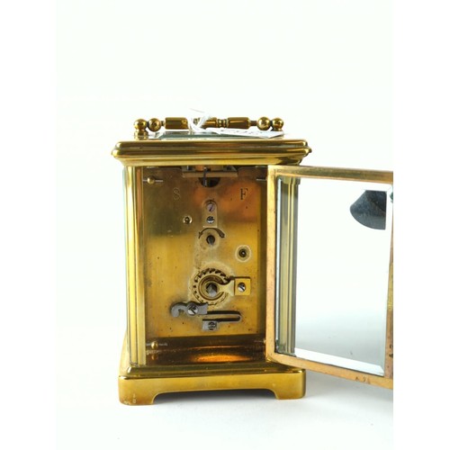 689 - An early C20th brass carriage clock with white dial and Roman numerals, movement engraved SF, height... 