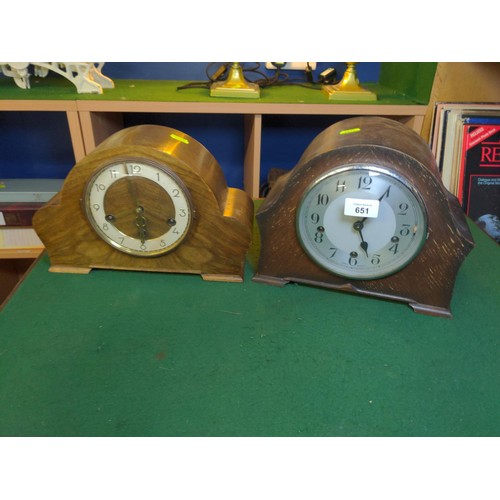 651 - 2 wood cased mantle clocks, each with key. Larger clock has Smiths movement