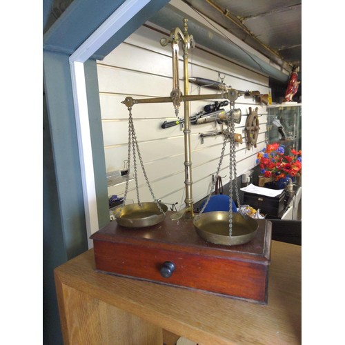 683 - Set of small balance scales on wood base with drawer, by Grave Short & Co, includes 3 small weig... 