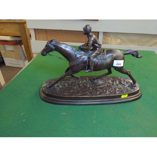 684 - Mene racehorse & jockey metal figure, length of base 40cms