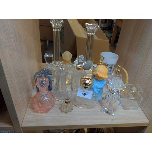 691 - Approx 13 scent bottles , 20cm tall glass candlestick  & a TG Green 1911 commemorative beaker