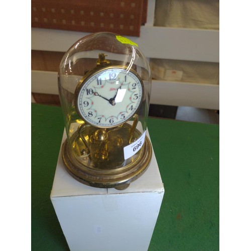 696 - Small glass domed brass clock, full ht 16cms