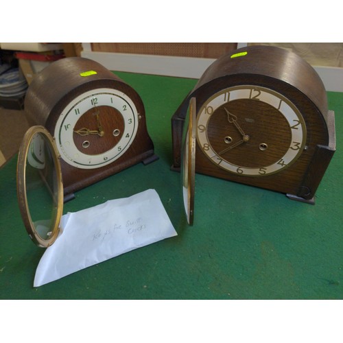 698 - 2 mantle clocks, with keys