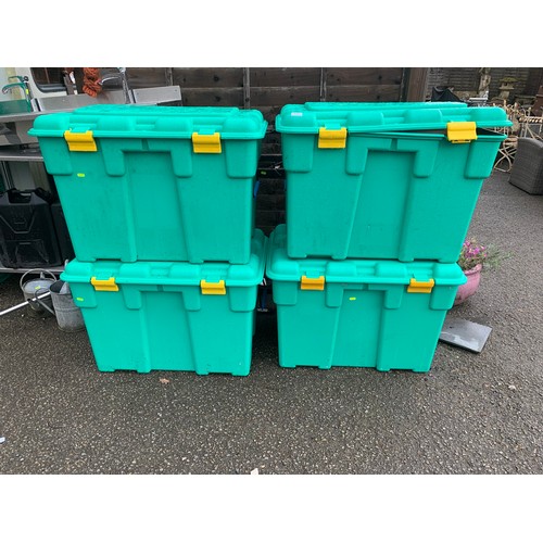 257 - 4 large plastic storage boxes - does not include any contents