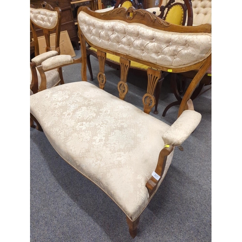 1104 - Salon sofa and armchair on castors. Sprung seated in cream fabric. Sofa 126cm wide x 50cm deep x 96c... 