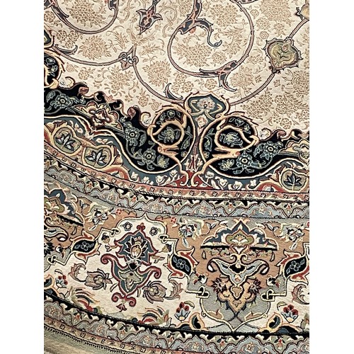 1230 - Finely woven Irani circular rug in shades of cream, blush and pale blue, diameter 2.5m