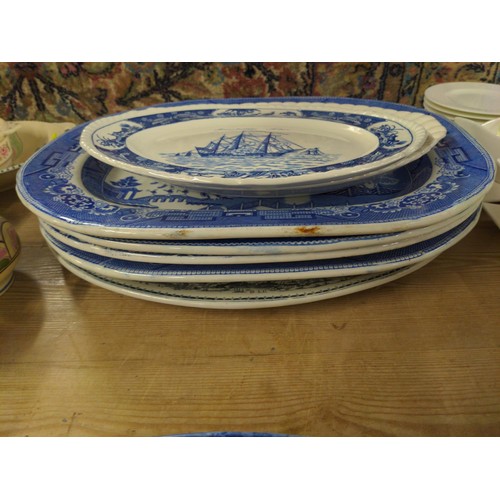 718 - 8 blue and white meat / serving platters inc. Wedgwood.