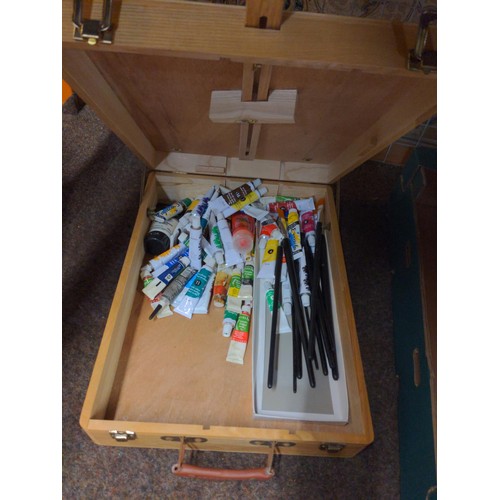 731 - Box containing artists materials e.g. oils, brushes, field easel & acrylics.