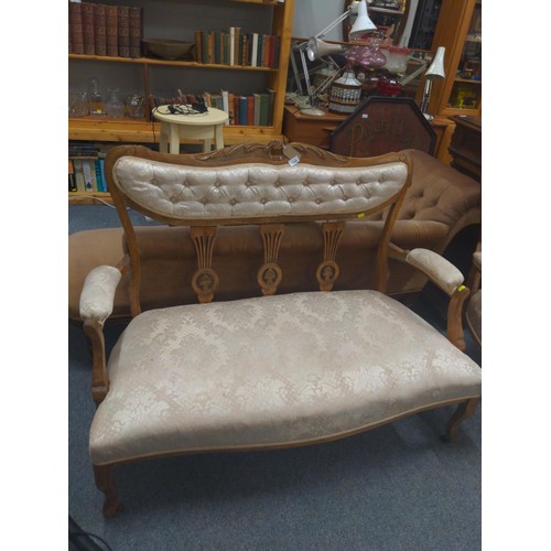 1104 - Salon sofa and armchair on castors. Sprung seated in cream fabric. Sofa 126cm wide x 50cm deep x 96c... 