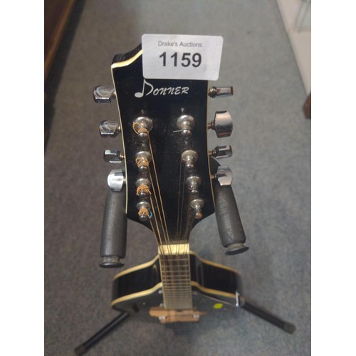 1159 - Donner acoustic mandolin in black.